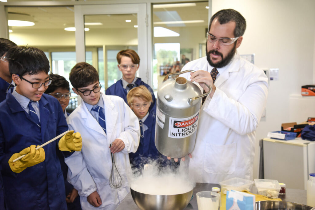 Teacher and students doing a science experiment