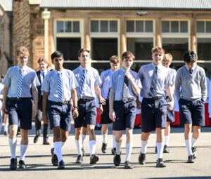 Students walking down towards the camera