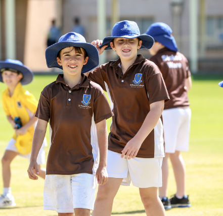 Students walking on an oval