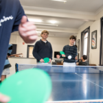 boys playing table tennis