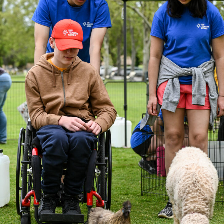 Tommy enjoying the Sony Camp Fair with his guest and Wilderness School buddy.