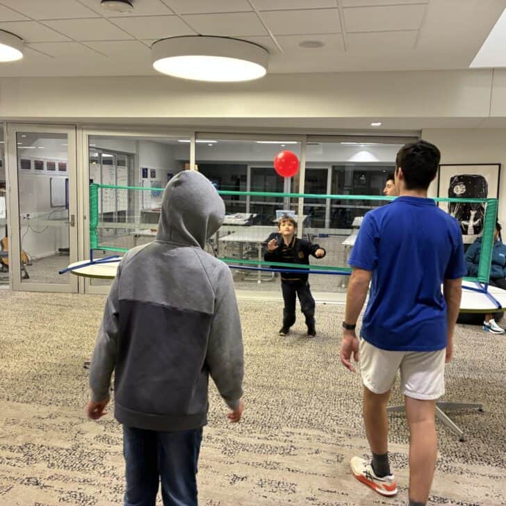 Dylan Tran, Oscar Kleinig, Harvey Kupniewski and Daniel Spyrou play balloon volleyball with their buddies
