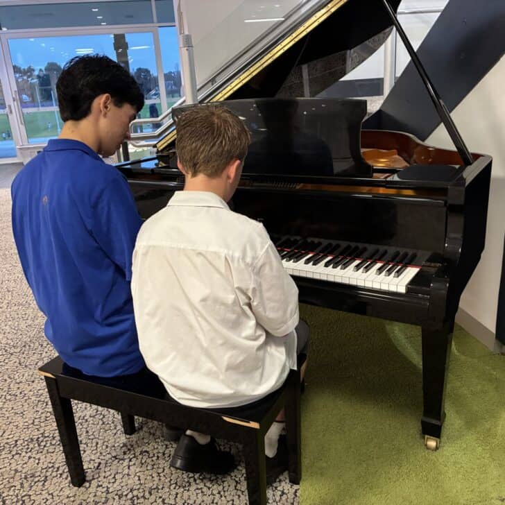Ryan Weinert and buddy, Chase play piano together